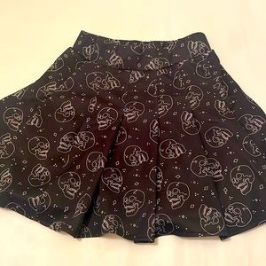 a nice slightly used black and white skull skater skirt